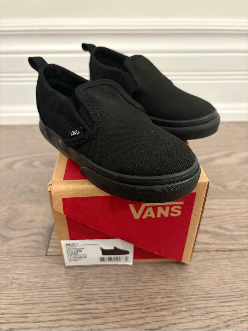 Vans Kids Slip-On Sneakers in Black